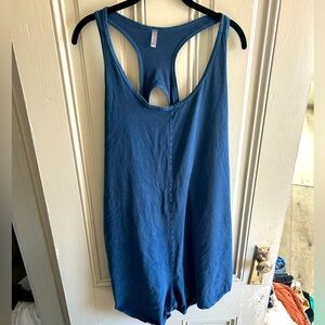 Free People Movement navy blue romper XL. Tiny hole at seam